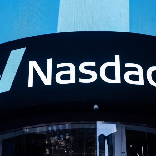 FILE PHOTO: The Nasdaq logo is displayed at the Nasdaq Market site in Times Square in New York City, U.S., December 3, 2021. REUTERS/Jeenah Moon